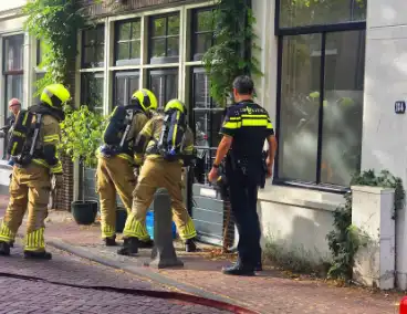 Deur geforceerd om brand in vaatwasser te bereiken