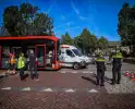 Schade na botsing tussen bus en bestelbus