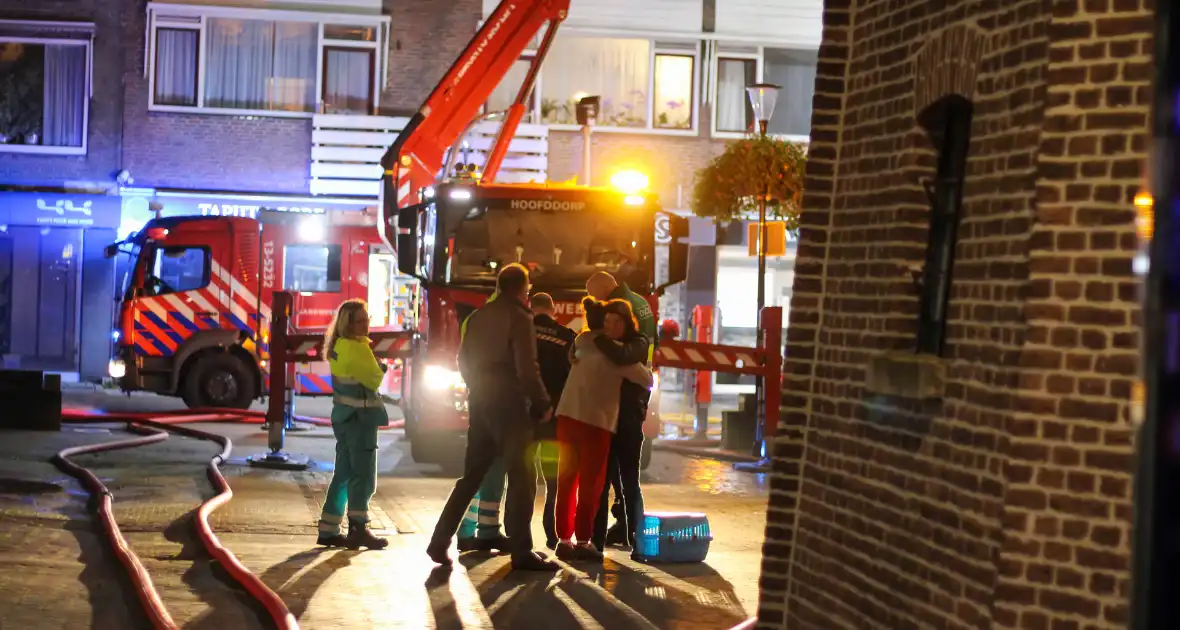 Daken verwoest door grote uitslaande brand - Foto 4