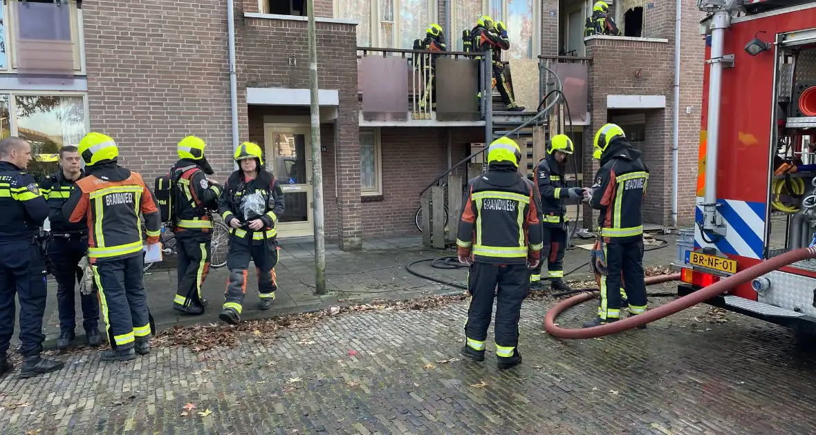 Deur open gezaagd bij brand - Foto 1