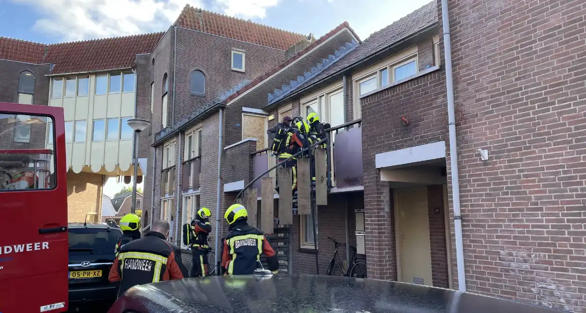 Deur open gezaagd bij brand - Foto 2