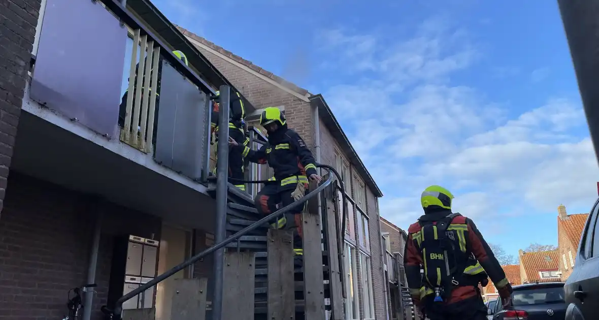 Deur open gezaagd bij brand - Foto 4