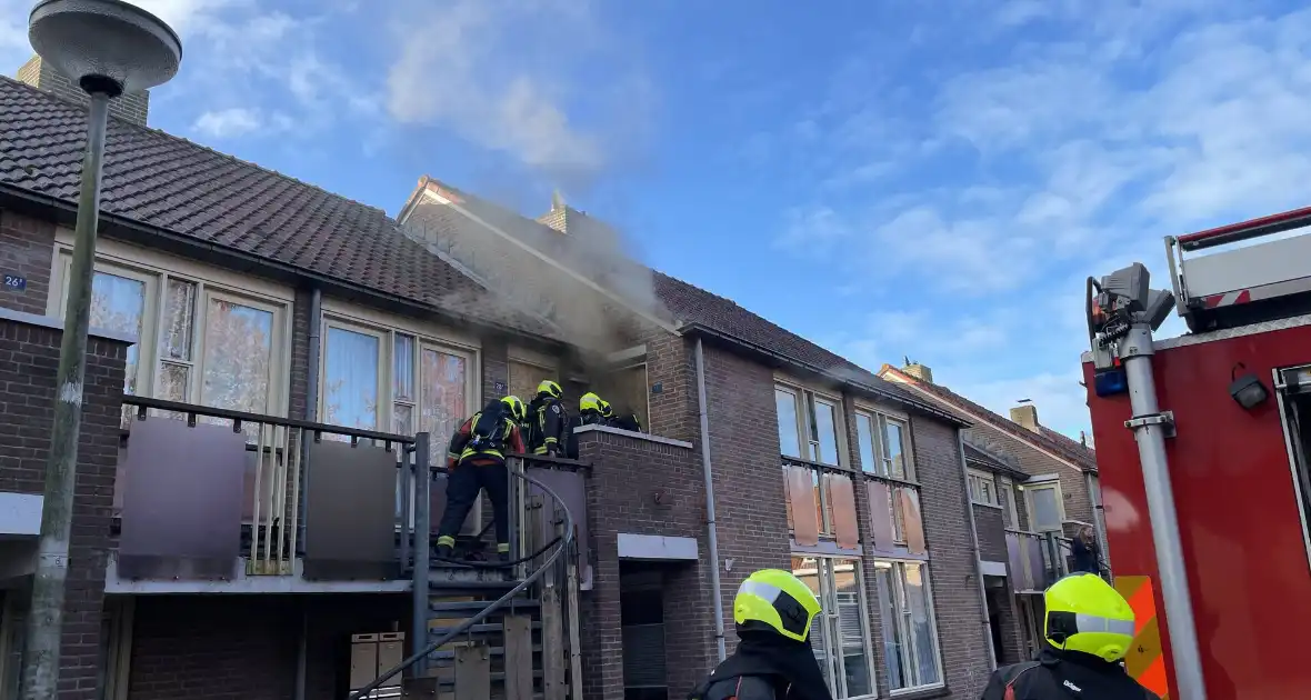 Deur open gezaagd bij brand - Foto 5