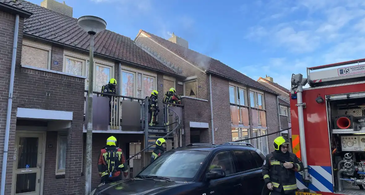 Deur open gezaagd bij brand - Foto 7