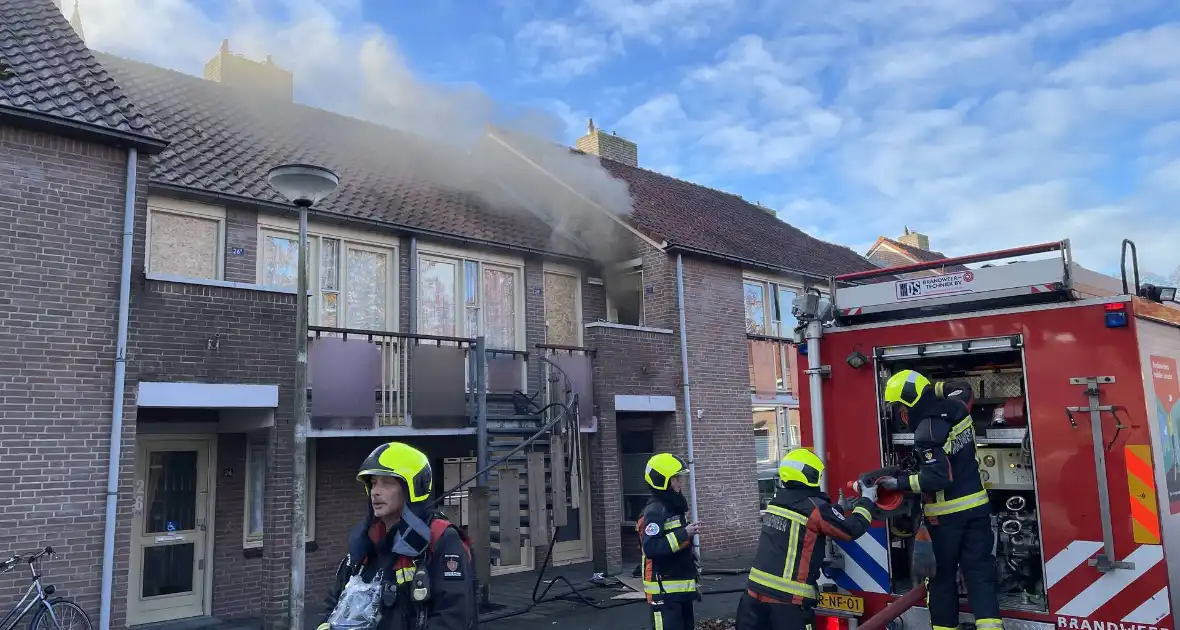 Deur open gezaagd bij brand - Foto 8