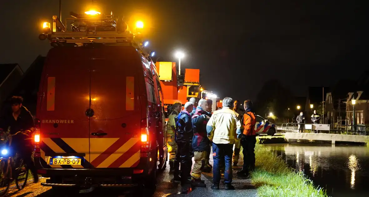 Zoekactie na aangetroffen scooter in het water - Foto 1