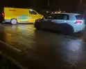 Schade na botsing tussen auto en bestelbus