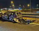 Auto raakt in slip op de snelweg en crasht met ander voertuig