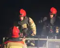 Brandweer veegt schoorsteen na brandmelding