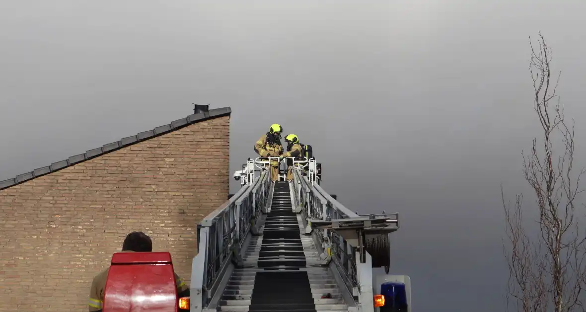 Veel rook bij brand in schoorsteen - Foto 6