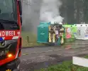 Veel rook bij brand in bovengrondse textielcontainer