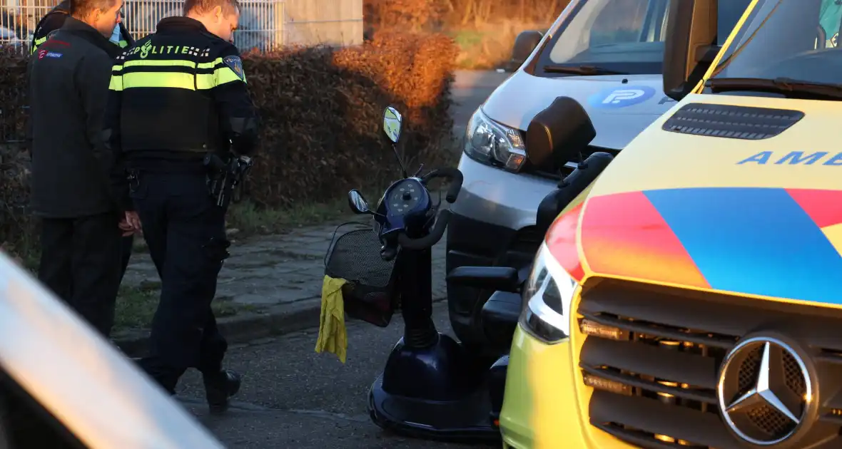 Persoon op scootmobiel gewond na ongeval - Foto 1