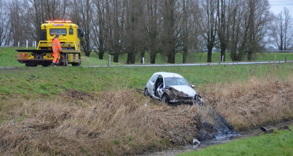 Gestolen auto crasht in sloot - Afbeelding 12