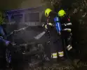Geparkeerde auto beschadigd door brand