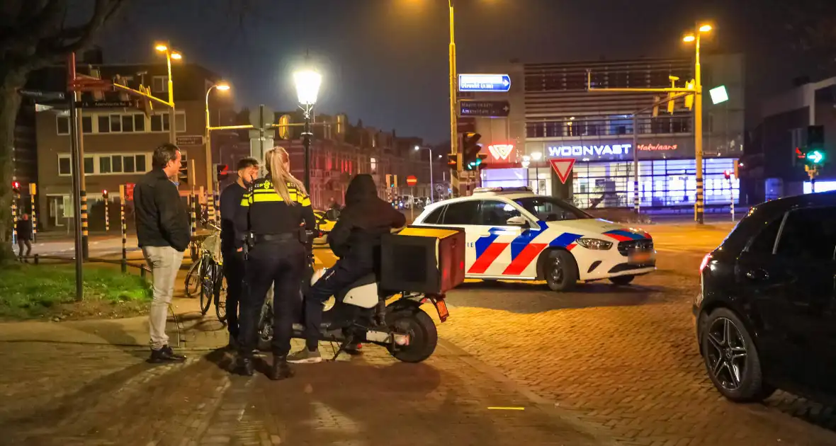 Voetganger gewond bij botsing met scooter - Foto 2