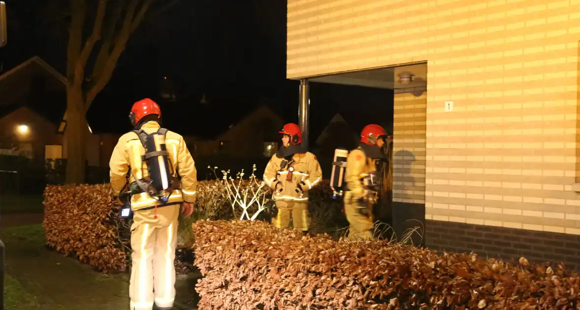 Brandweer controleert woning vanwege brand in lamp - Foto 5