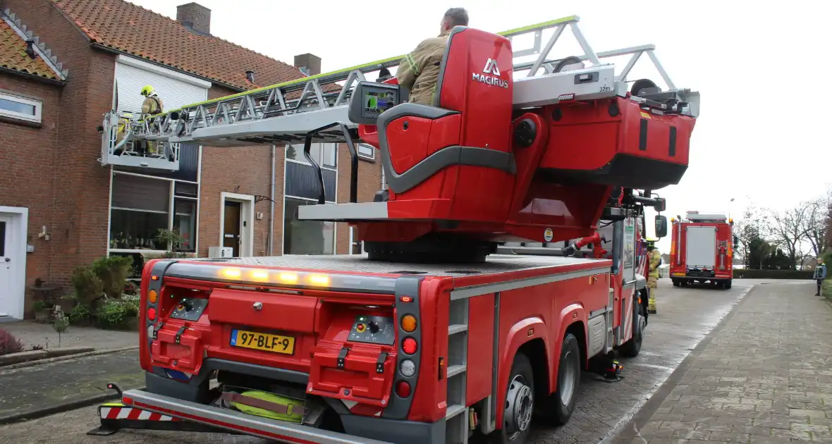 Brandweer stelt rolluik veilig - Foto 8