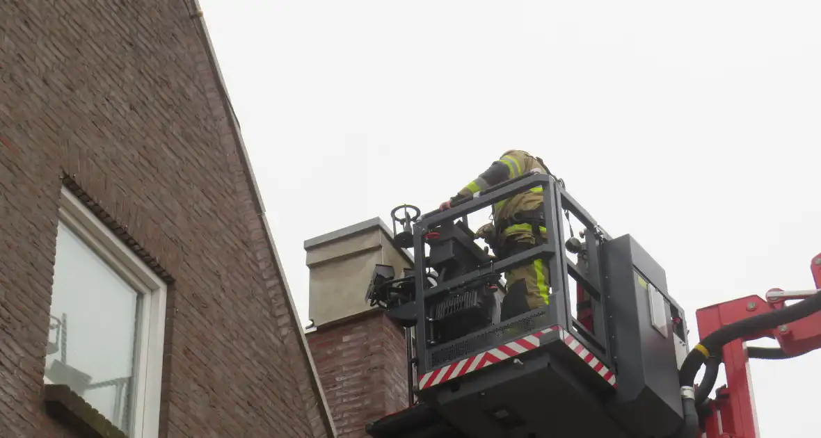 Dakbeschot waait van woning - Foto 4