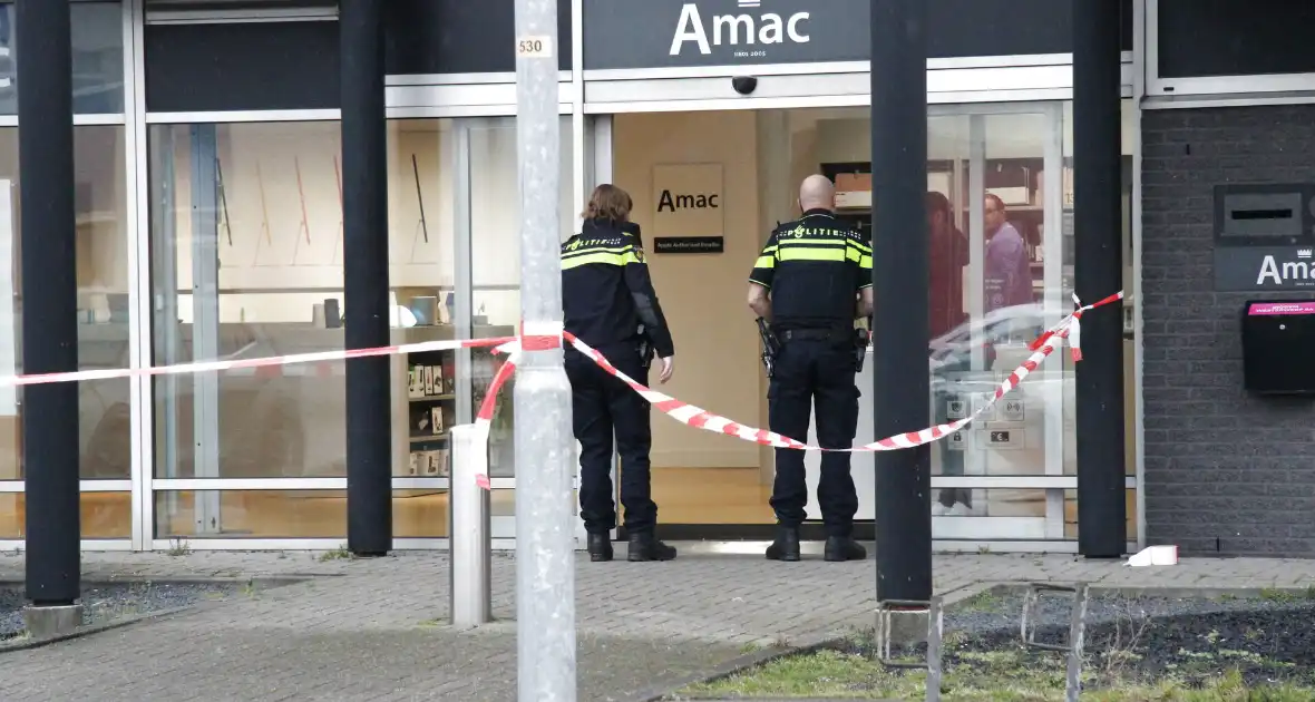 Politie doet onderzoek naar overval op Amac winkel - Foto 1