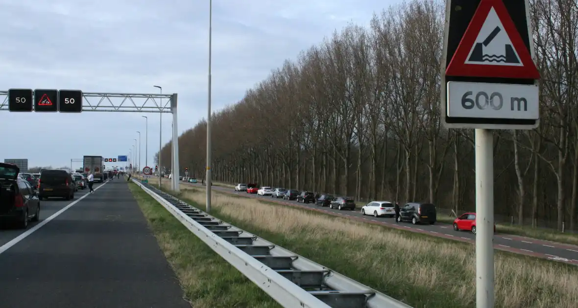 Flinke file door storing in brug - Foto 2