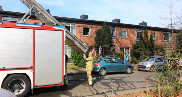 Bovenwoning vol rook door pan op het vuur - Afbeelding 6