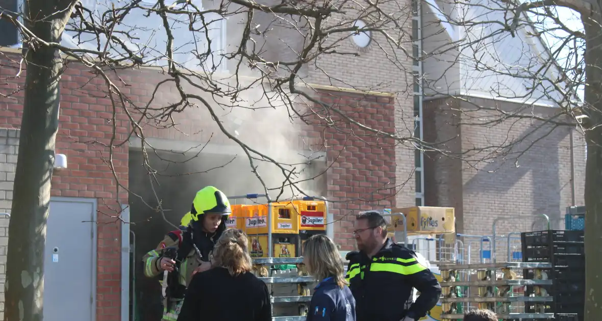 Supermarkt Albert Heijn ontruimd vanwege brand - Foto 7