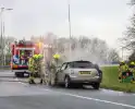 Mini Cooper uitgebrand op afrit van snelweg