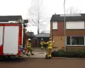Veel rook bij brand achter woning