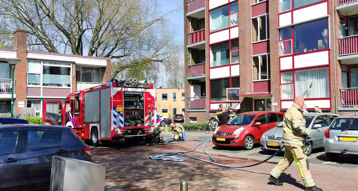 Brand op eerste verdieping van flatgebouw - Foto 2
