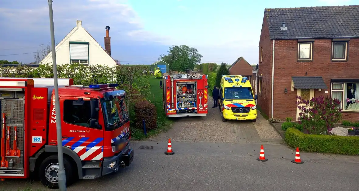 Persoon komt onder schranklader