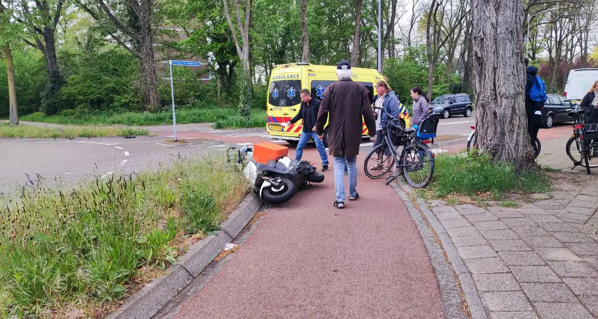 Scooterrijder en fietser in botsing - Foto 1
