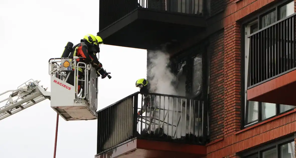 Grote schade na brand op balkon - Foto 4
