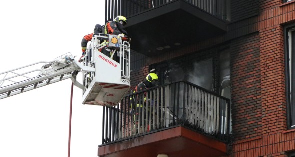 Grote schade na brand op balkon - Afbeelding 5