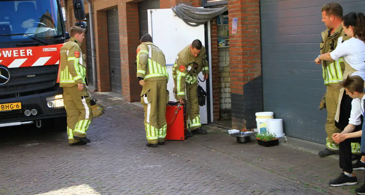 Vlam slaat in de pan bij restaurant - Foto 4