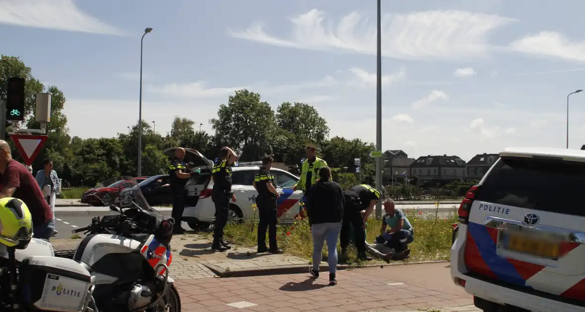 Agressieve man in de boeien na ongeval - Foto 5