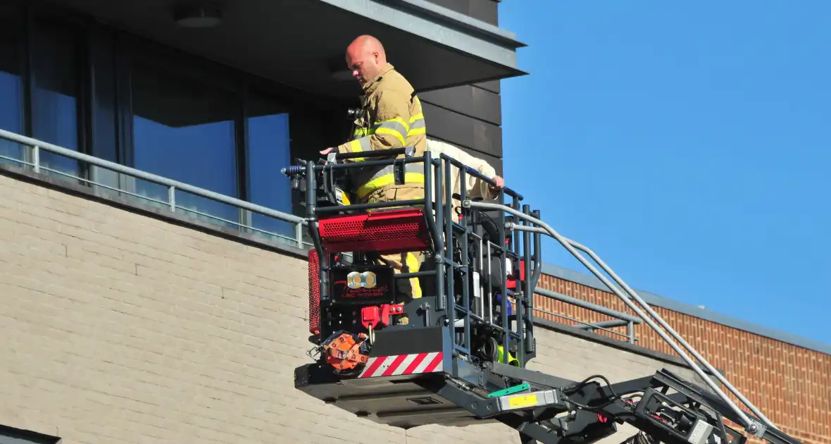 Personen uit brandende bovenwoning gered - Foto 4