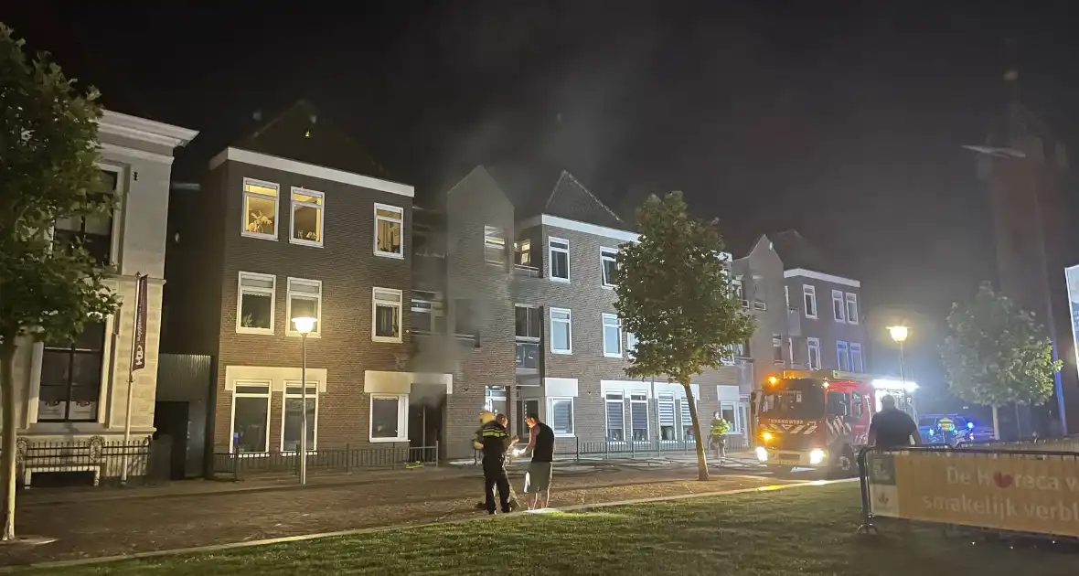 Forse rookontwikkeling bij brand in appartement - Foto 1