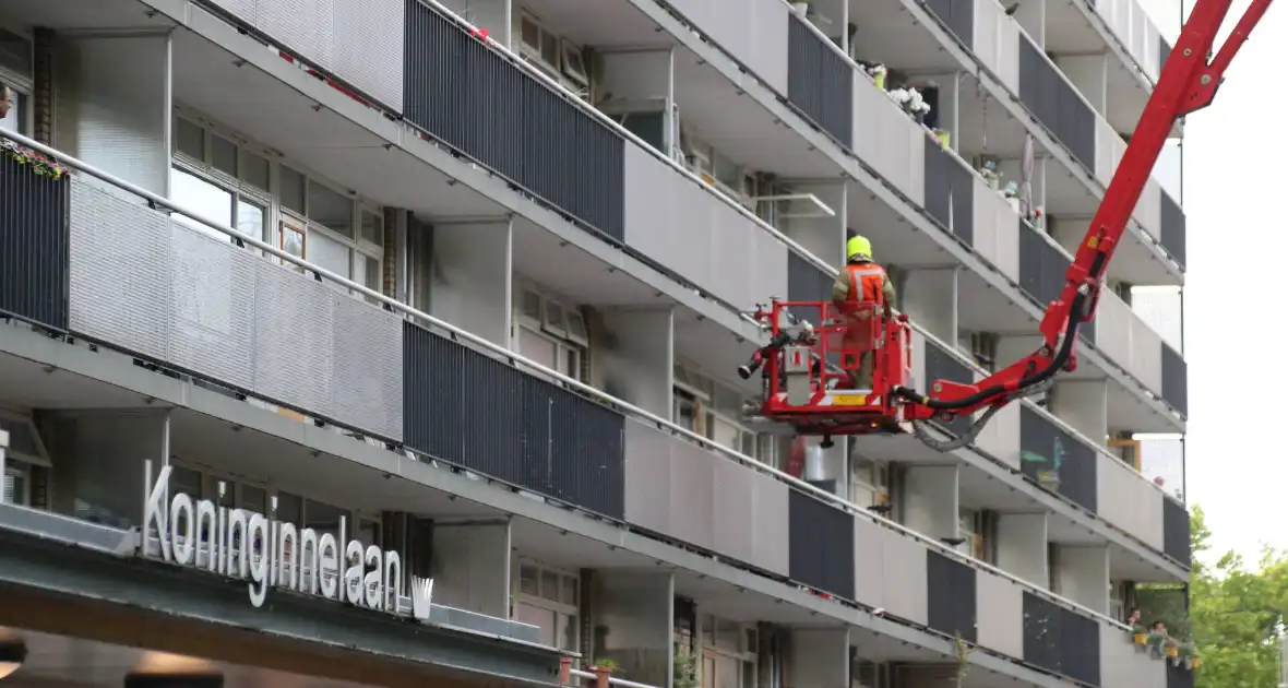 Hevige brand in portiekwoning - Foto 1