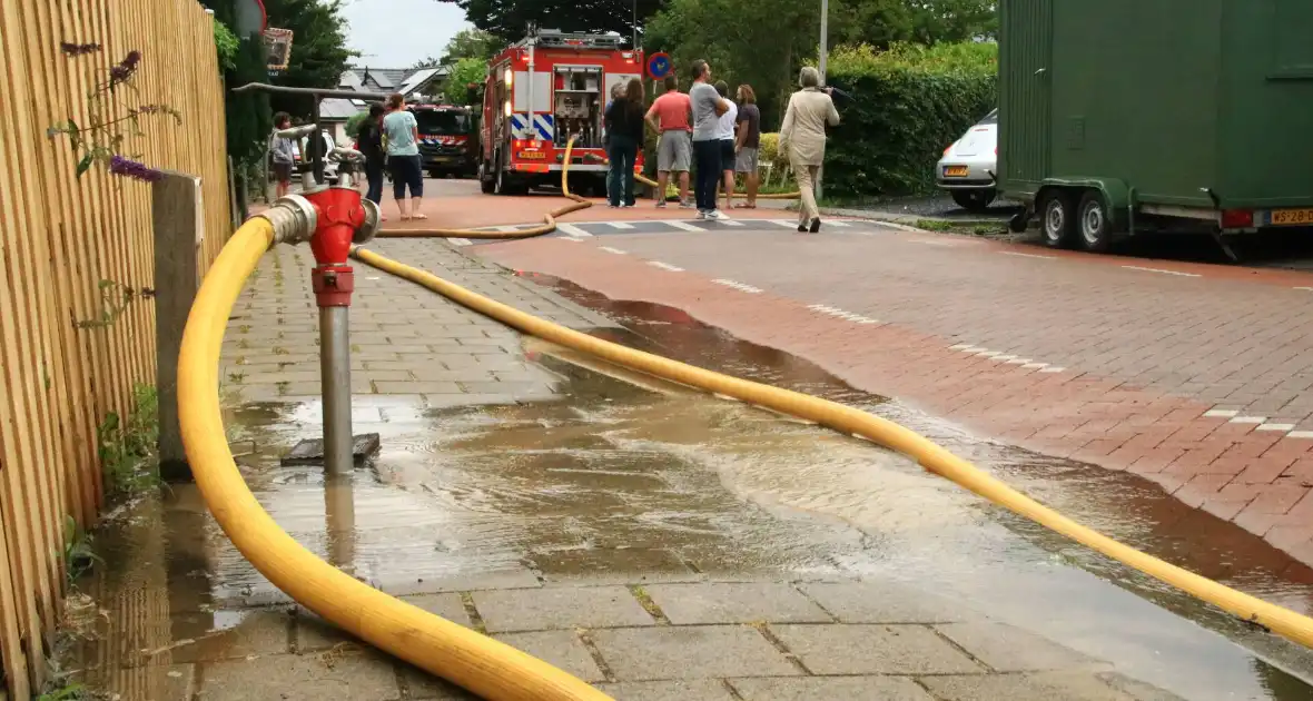 Brand op dak van woning - Foto 6