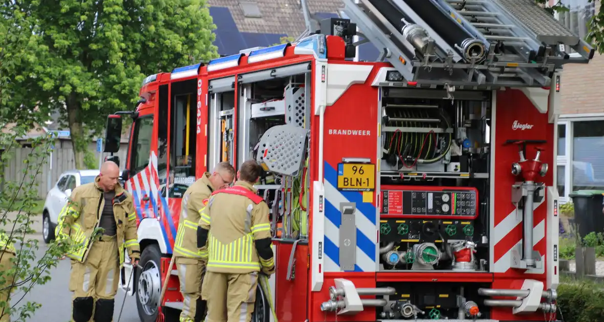 Brand in bouwcontainer met afval - Foto 1