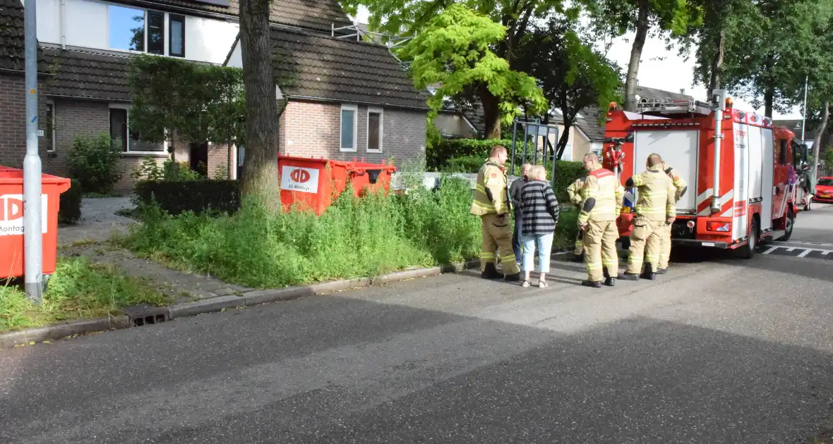 Brandweer hengelt sleutels uit put - Foto 2