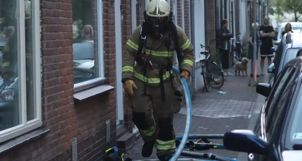 Brandweer forceert deur voor vlam in de pan - Foto 8