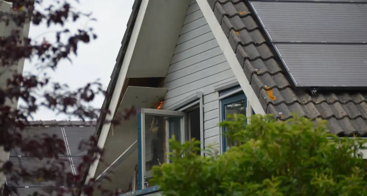 Brand in dak van woning - Foto 5